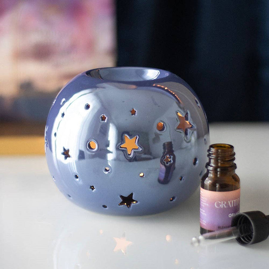Brûle-parfum étoile iridescente violette